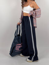 Pantalone con strisce laterali