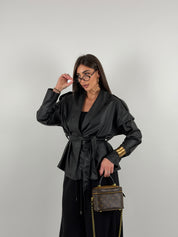 Giacca trench in ecopelle con cintura in vita