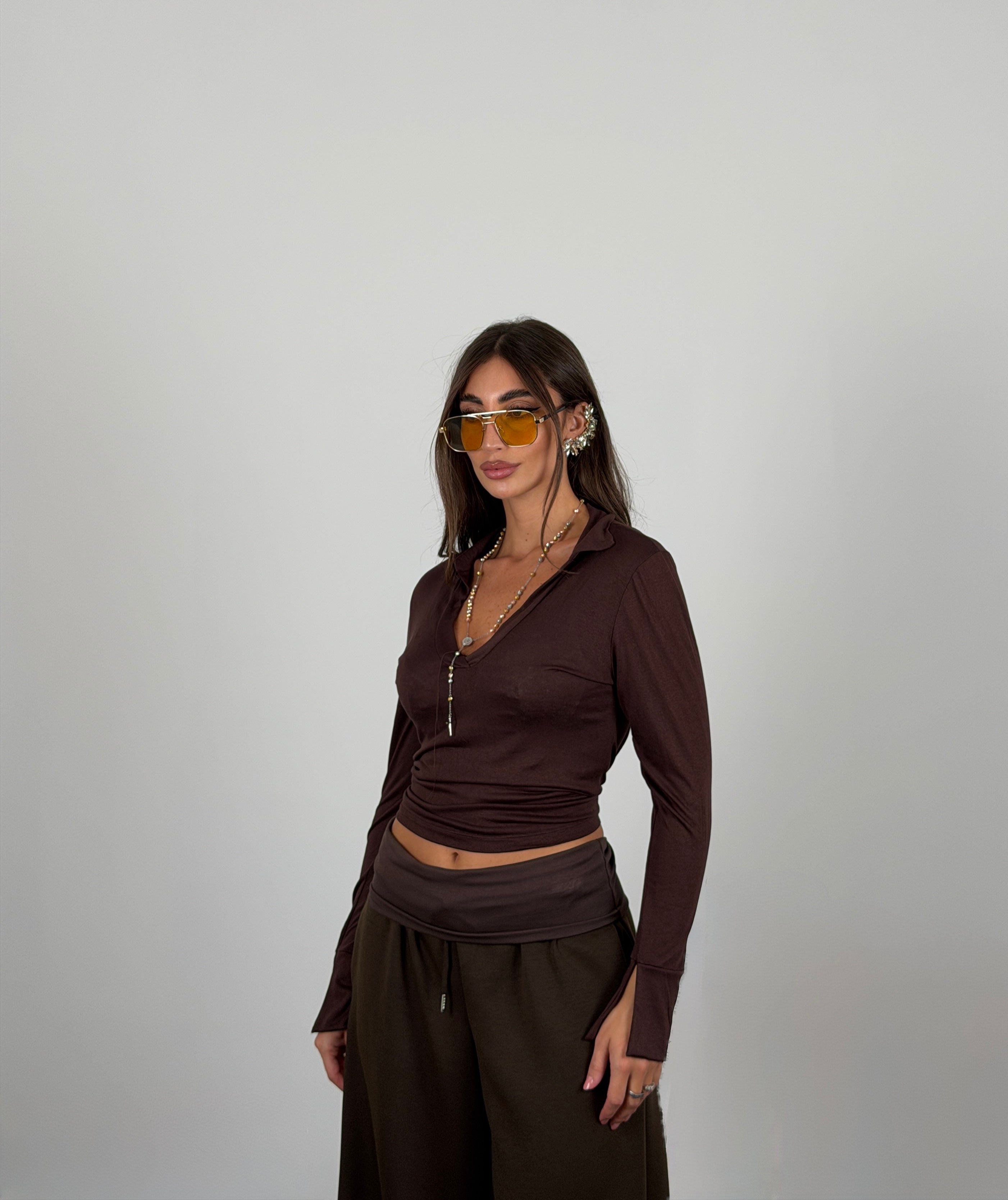 Maglia collo camicia semivelata