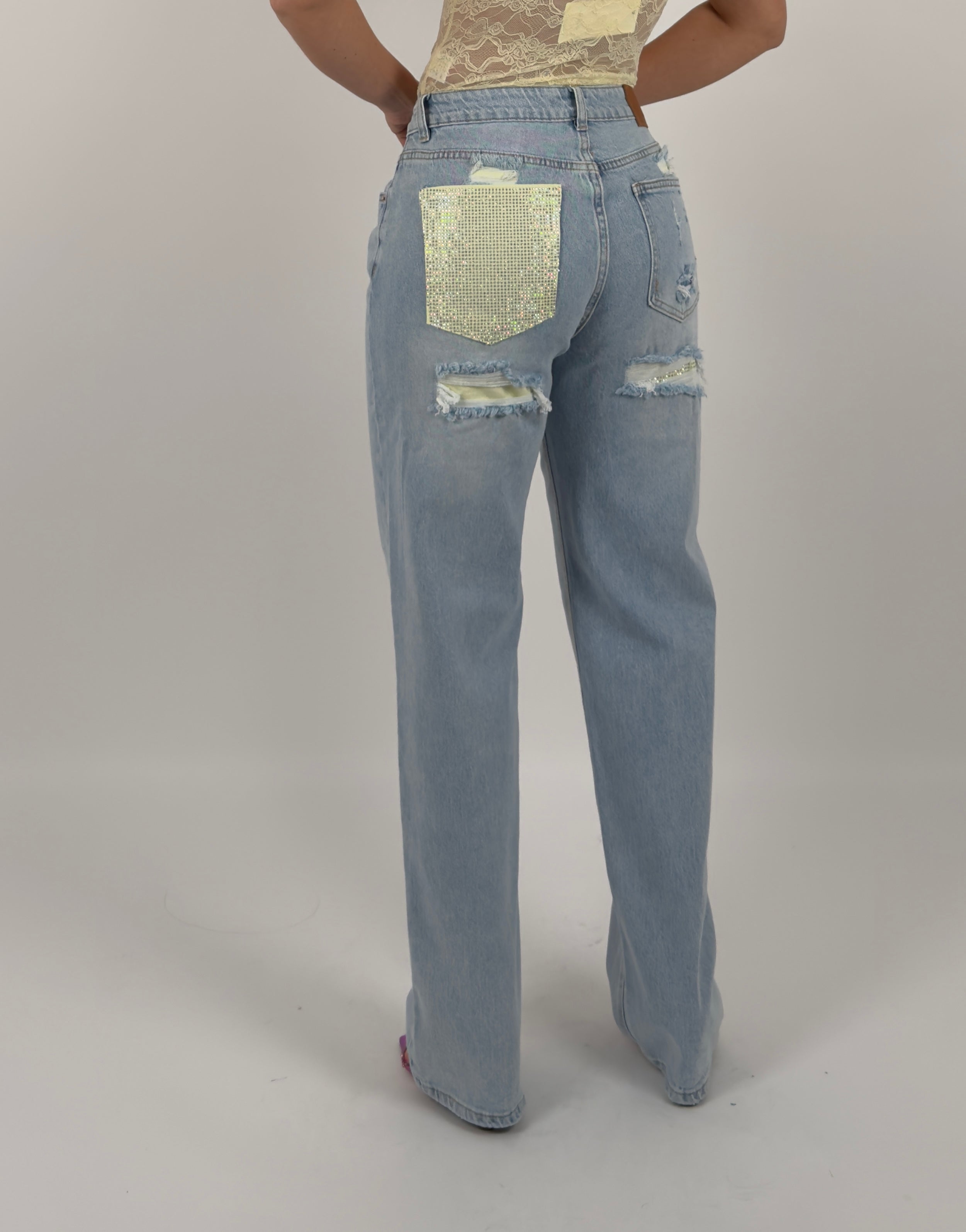 Jeans con tasca brillantinata