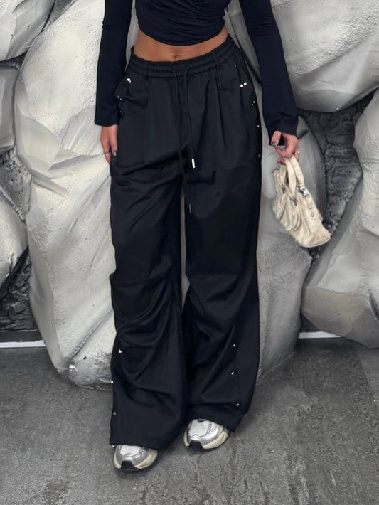 Pantalone borchie