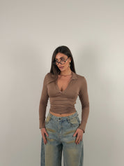 Maglia manica lunga semivelata con scollo a V