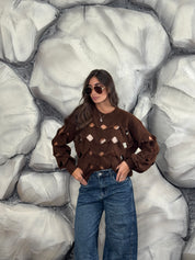 Maglione con aperture