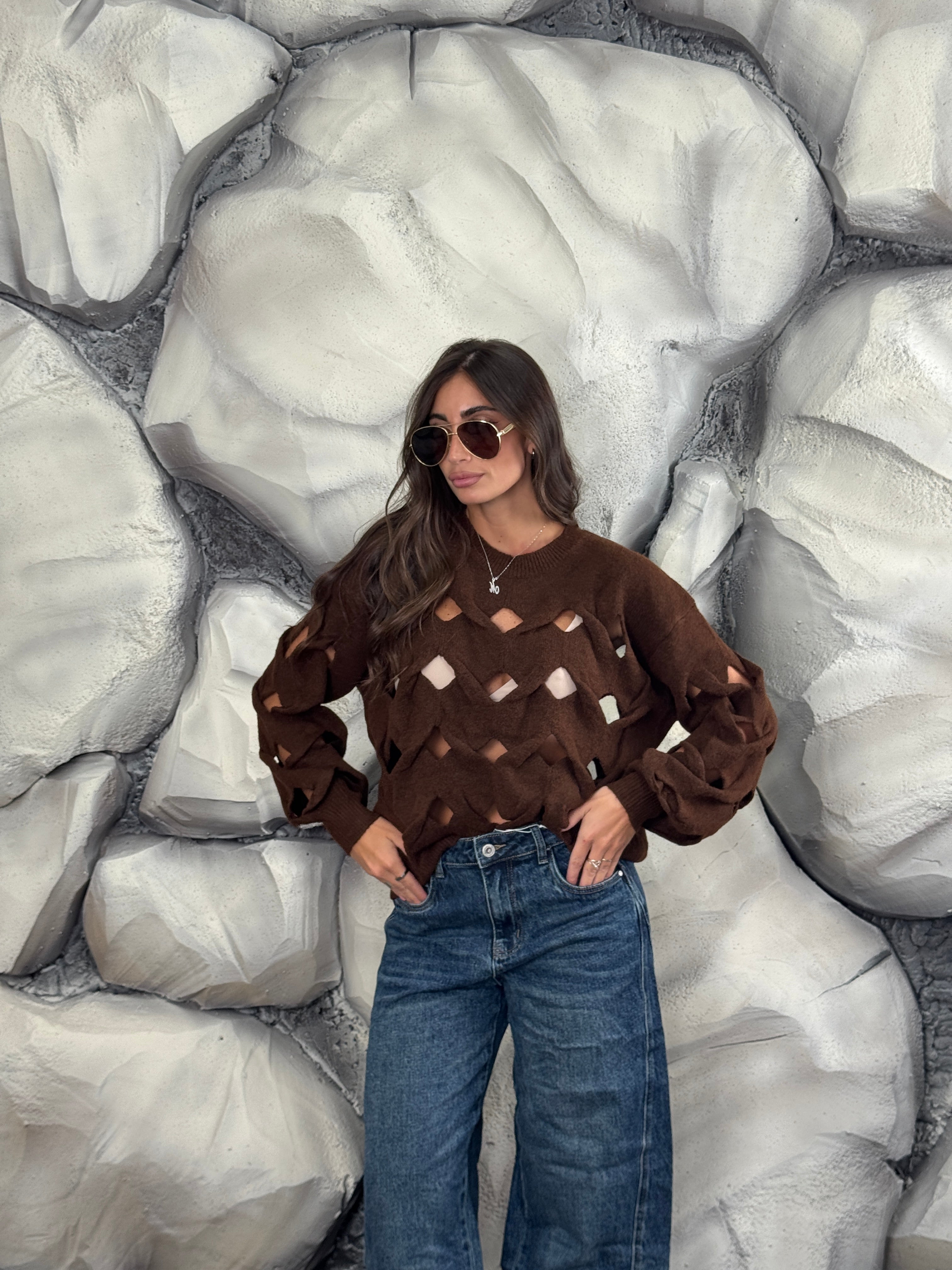 Maglione con aperture