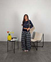Pantalone quadri con risvolto