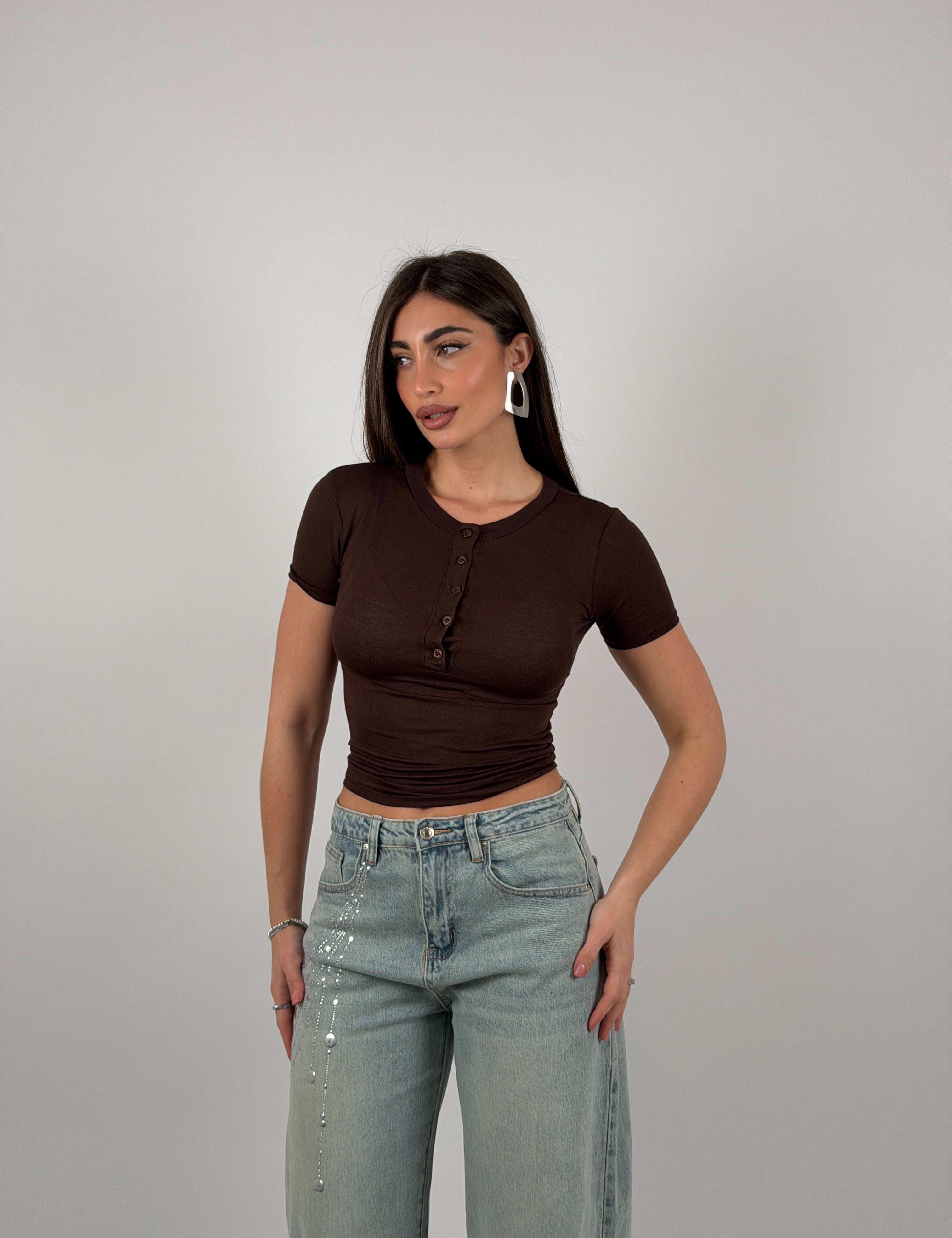 Maglia semivelata con bottoncini