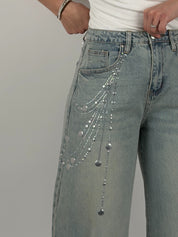 Jeans ballon con borchie laterali