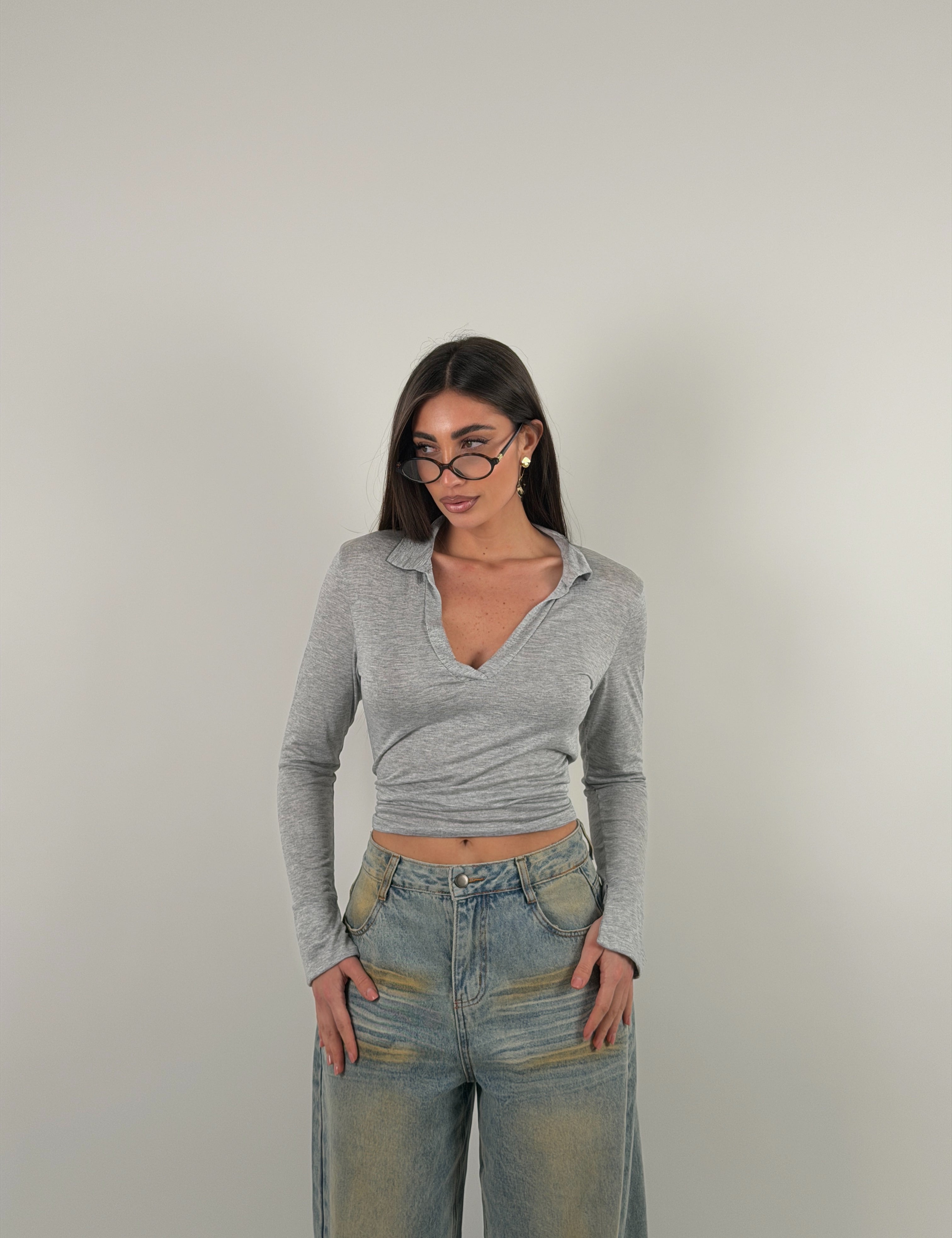 Maglia manica lunga semivelata con scollo a V