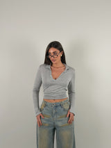 Maglia manica lunga semivelata con scollo a V