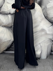 Pantalone con cintura in ecopelle