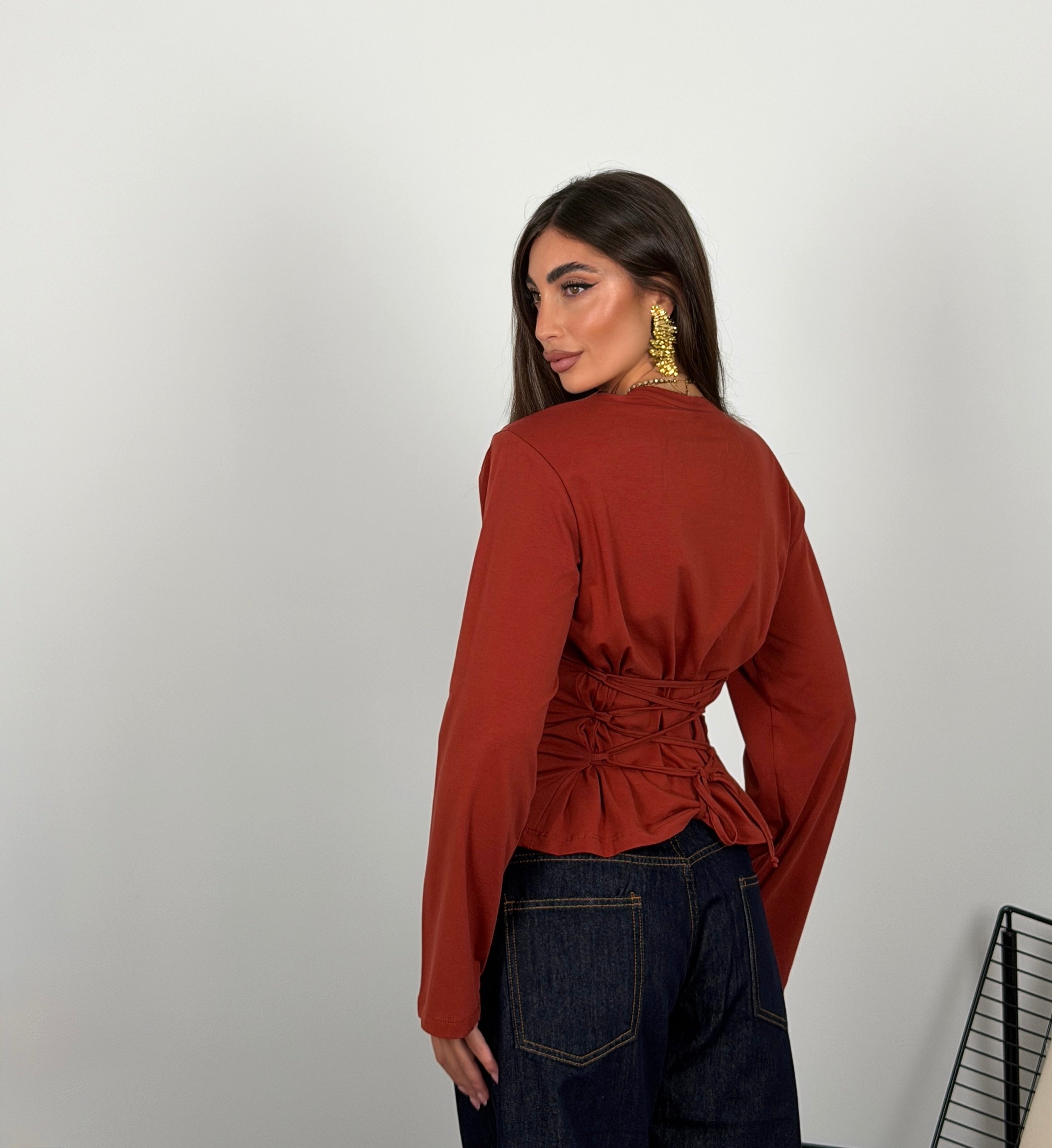 Maglia regolabile sul retro