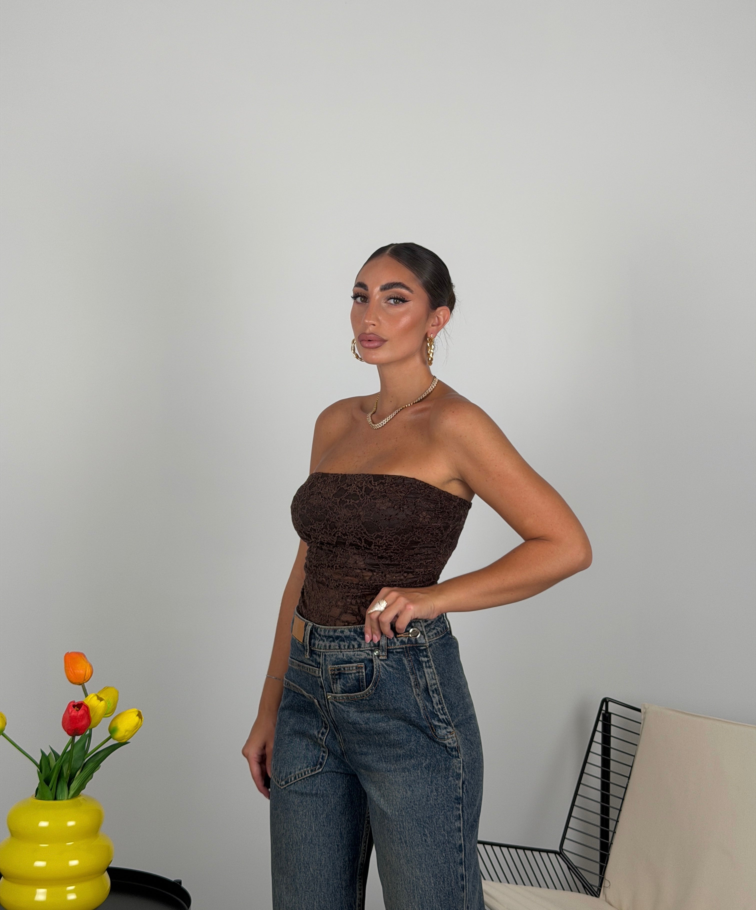 Top a fascia in merletto