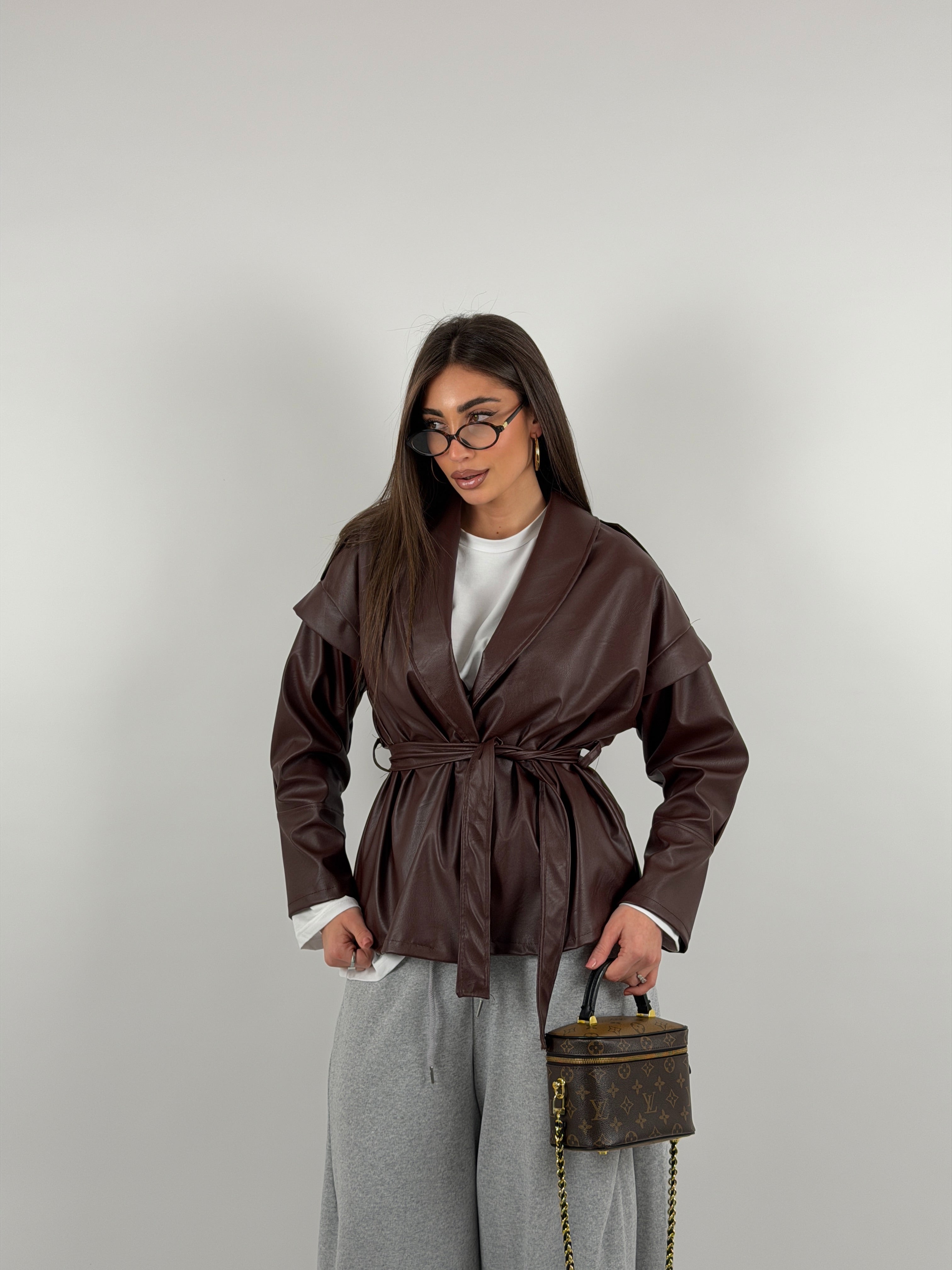 Giacca trench in ecopelle con cintura in vita