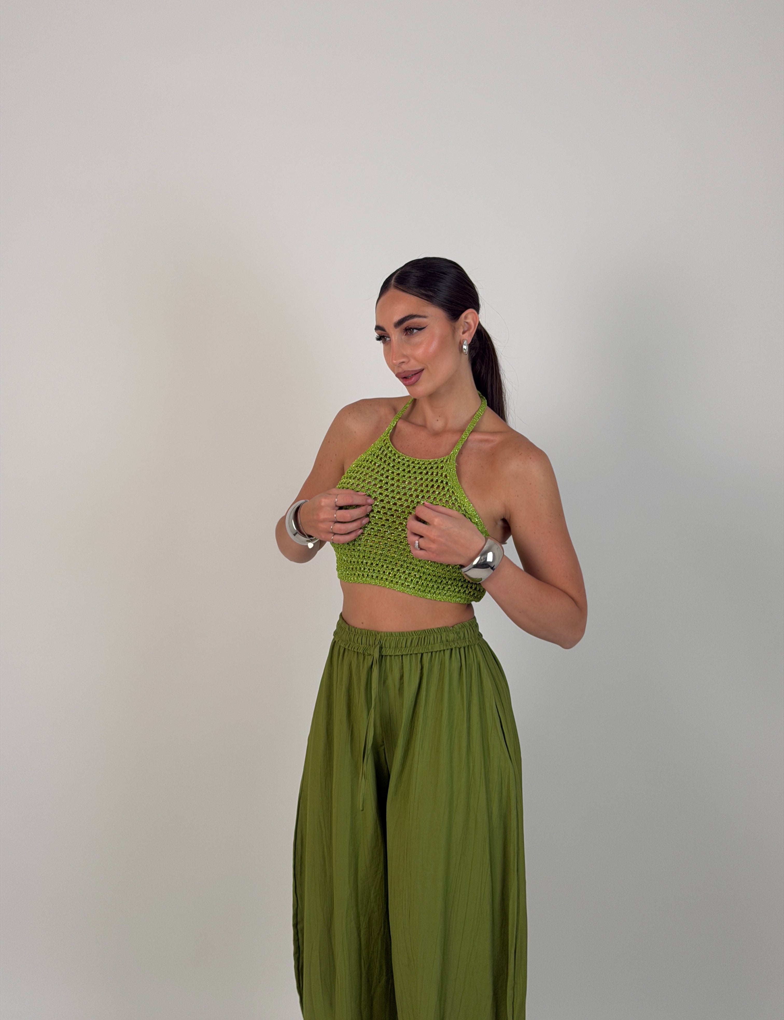Top uncinetto laminato