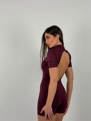 Tuta con spalline e schiena scoperta