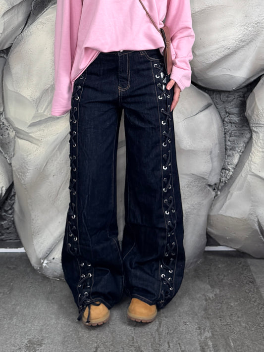 Jeans stringhe