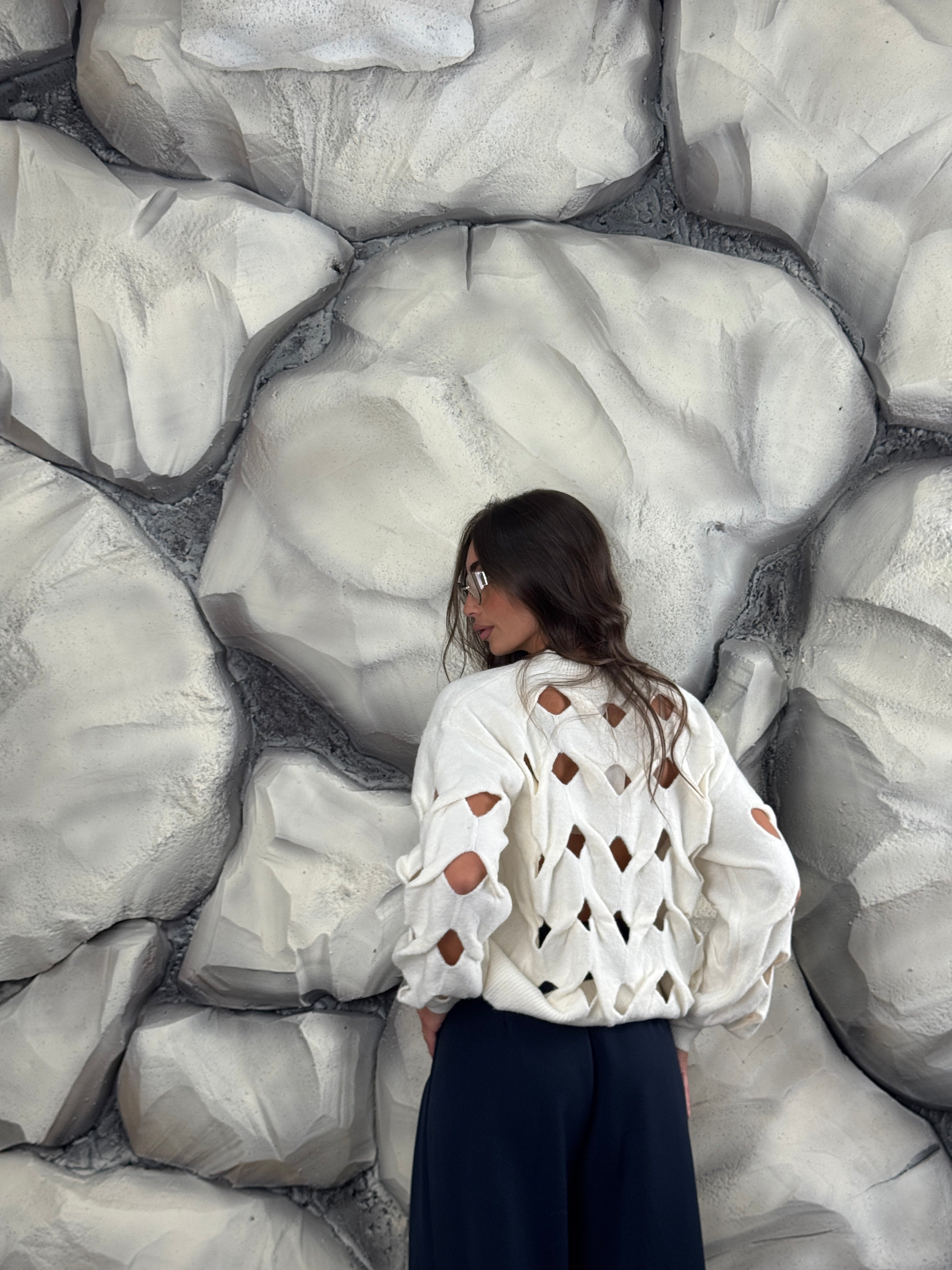 Maglione con aperture