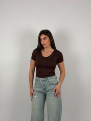 Maglia semivelata con scollo tondo e mezza manica