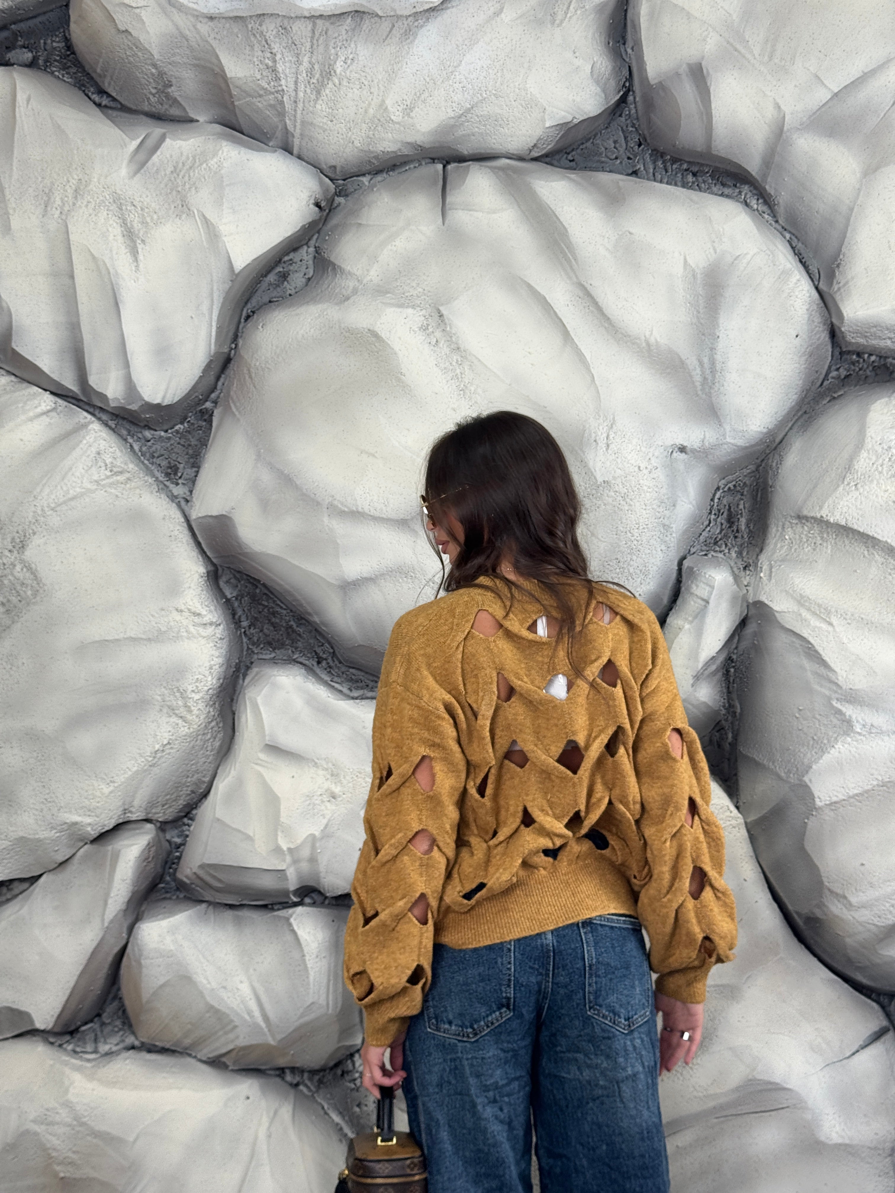 Maglione con aperture