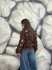 Maglione con aperture