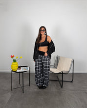 Pantalone quadri con risvolto