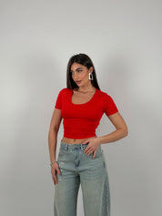 Maglia semivelata con scollo tondo e mezza manica