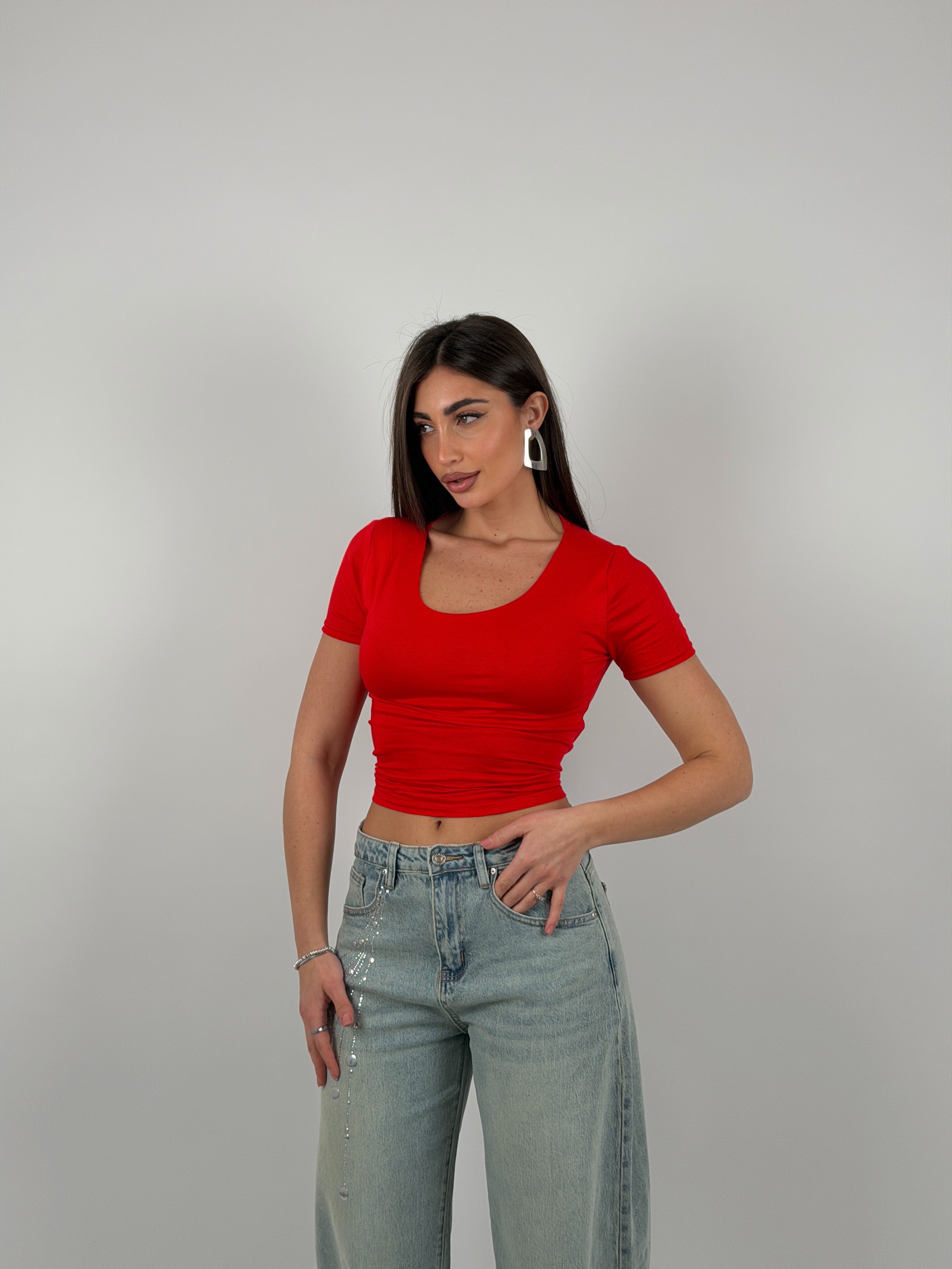 Maglia semivelata con scollo tondo e mezza manica