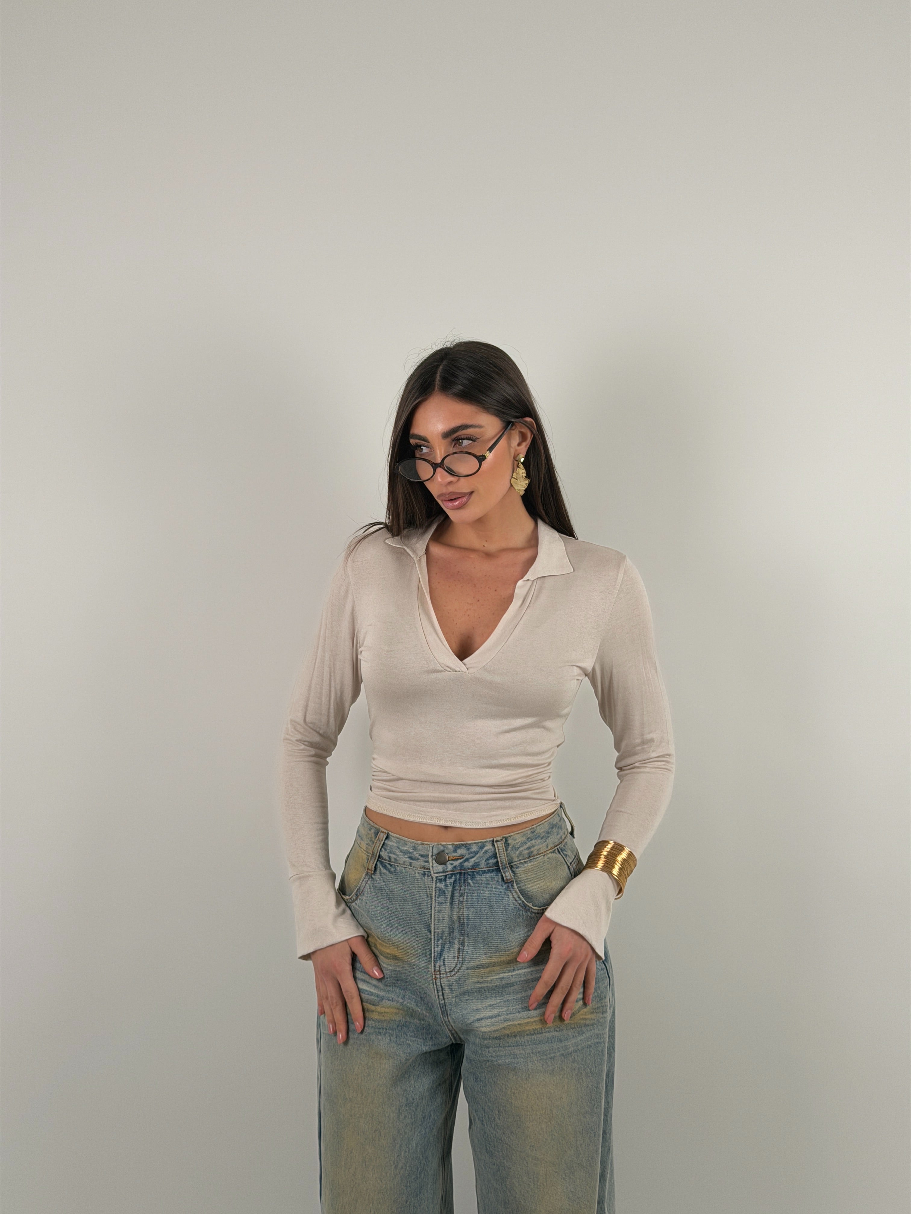 Maglia manica lunga semivelata con scollo a V