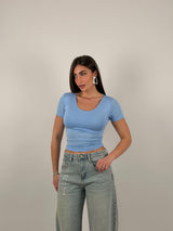 Maglia semivelata con scollo tondo e mezza manica