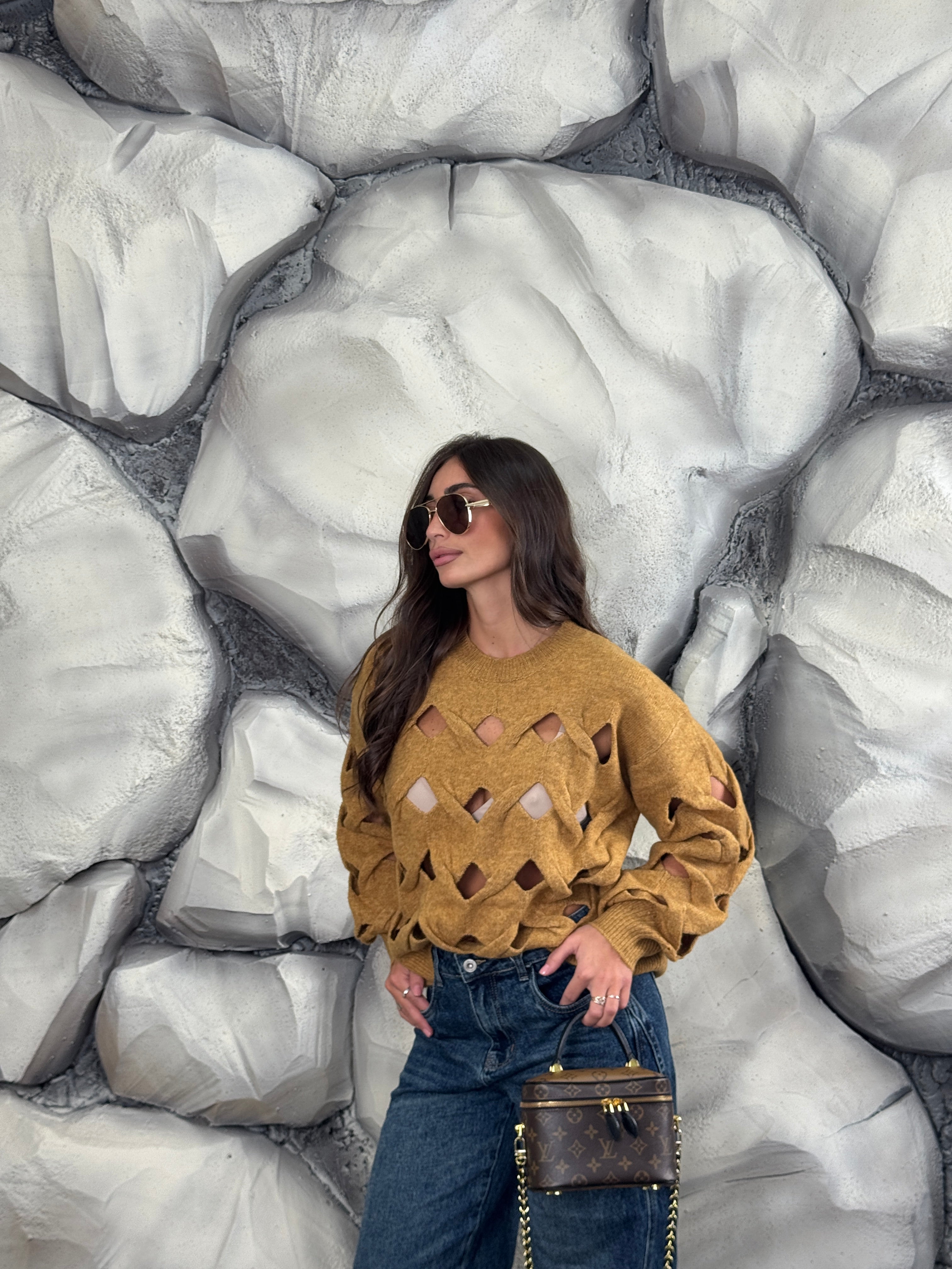 Maglione con aperture