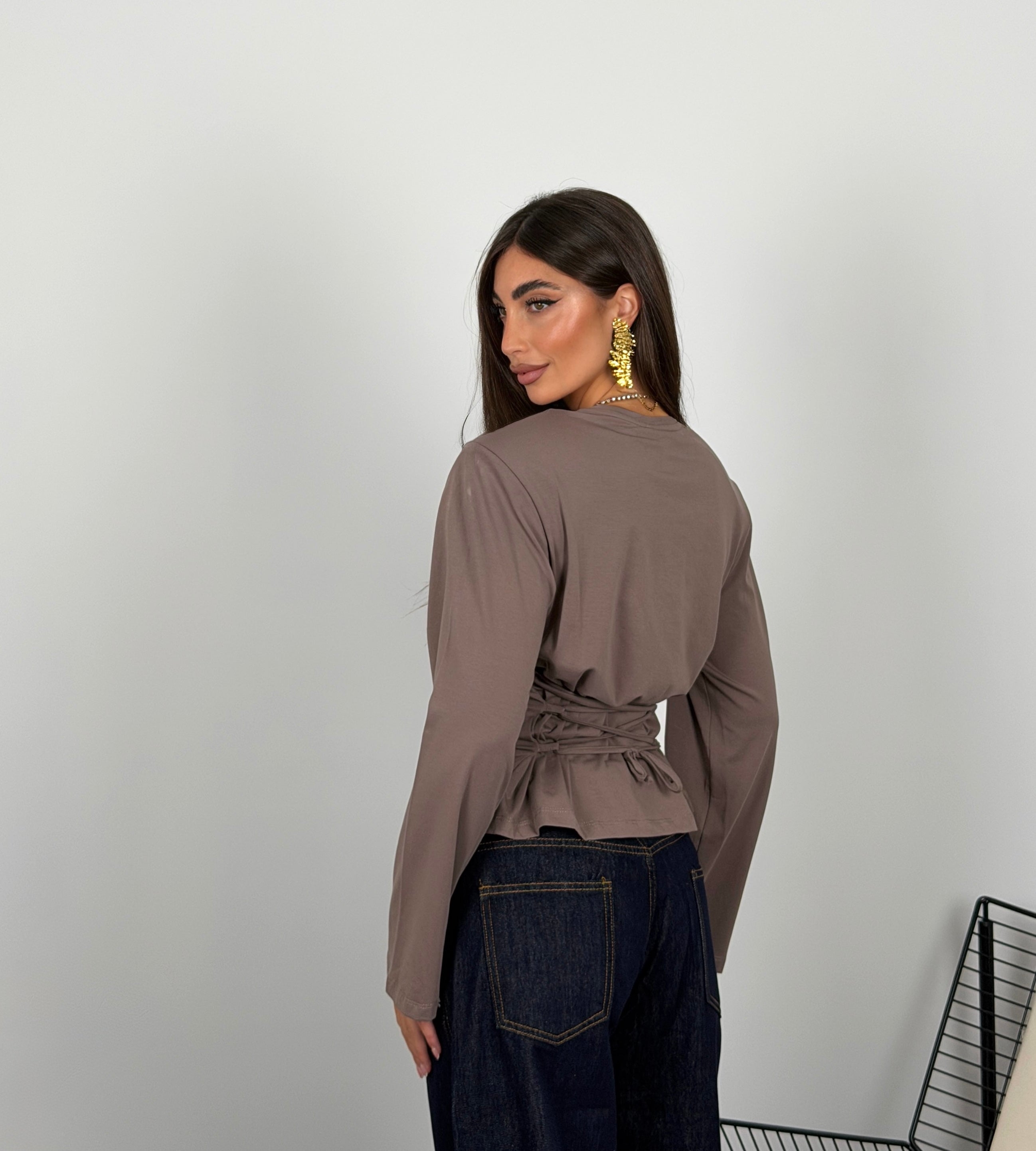Maglia regolabile sul retro