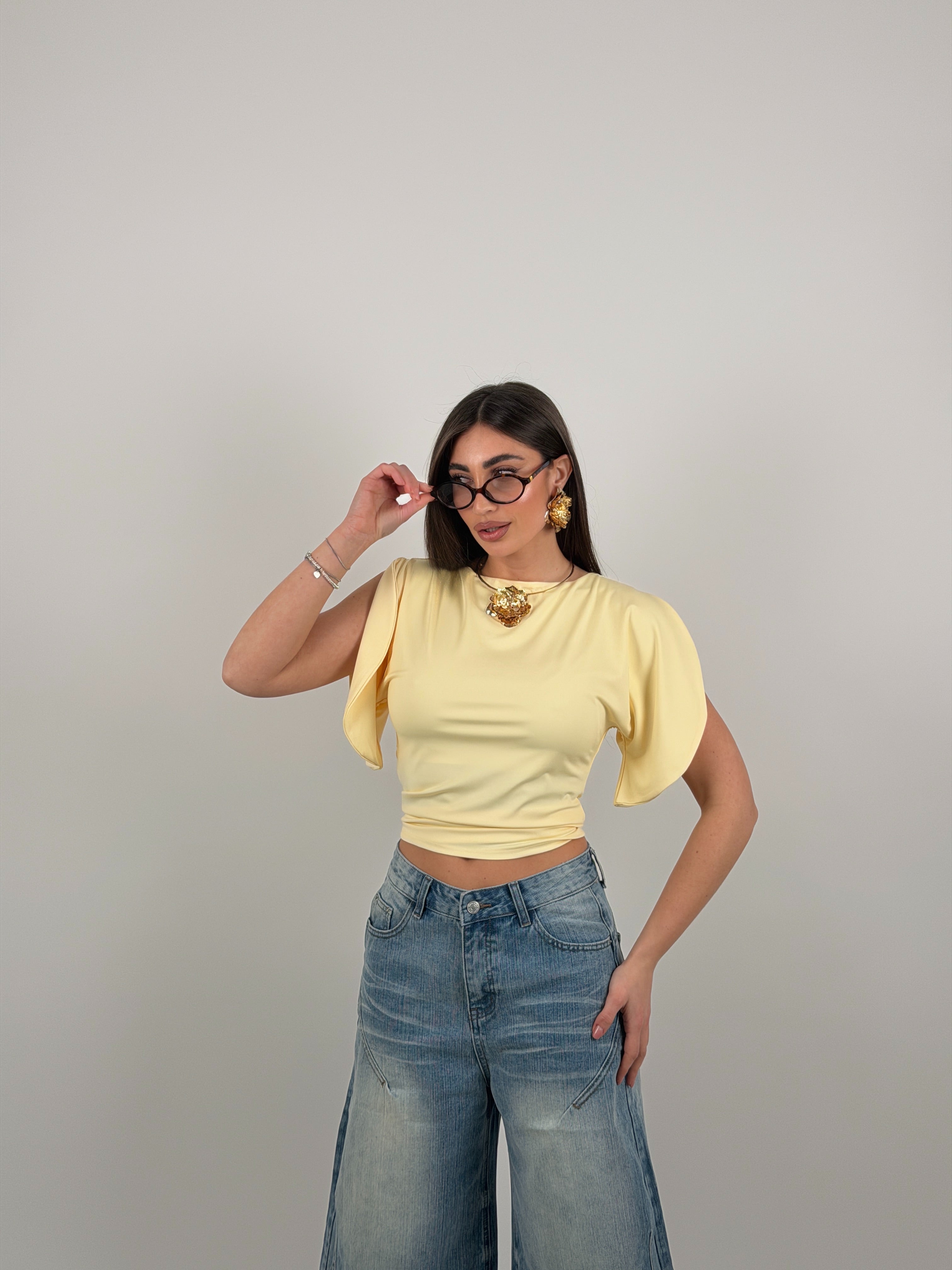 Maglia con mezza manica aperta in lycra