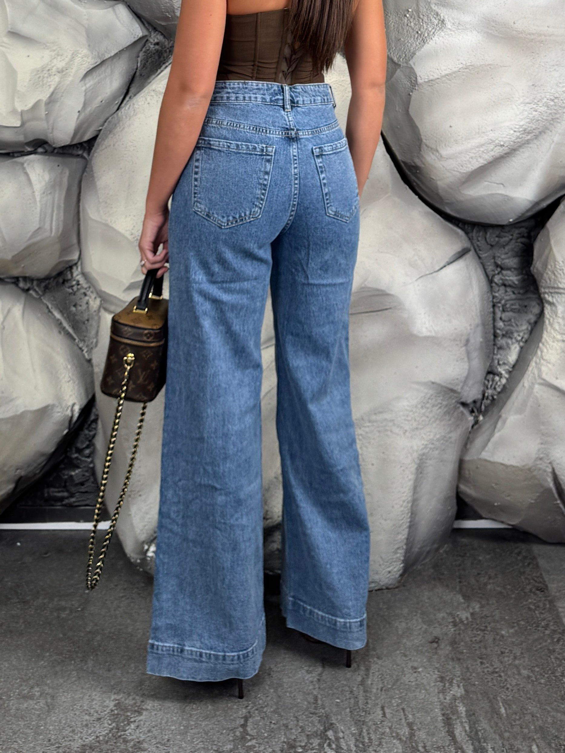 Jeans bottoni
