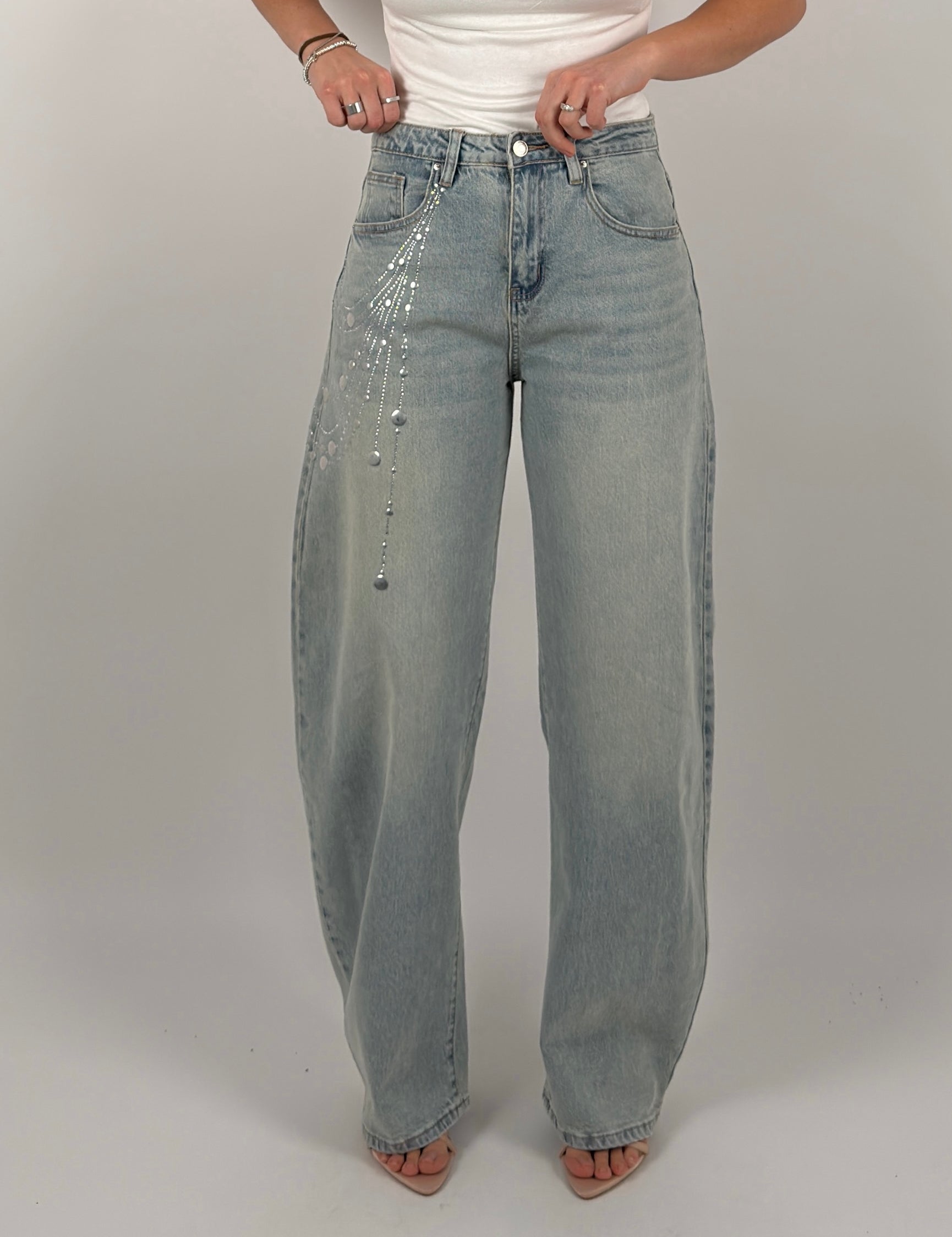 Jeans ballon con borchie laterali