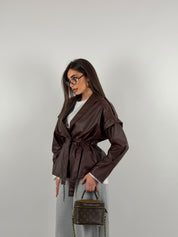 Giacca trench in ecopelle con cintura in vita