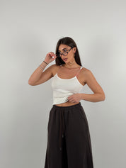 Top con bretelline in silicone trasparente, tessuto a costine strette