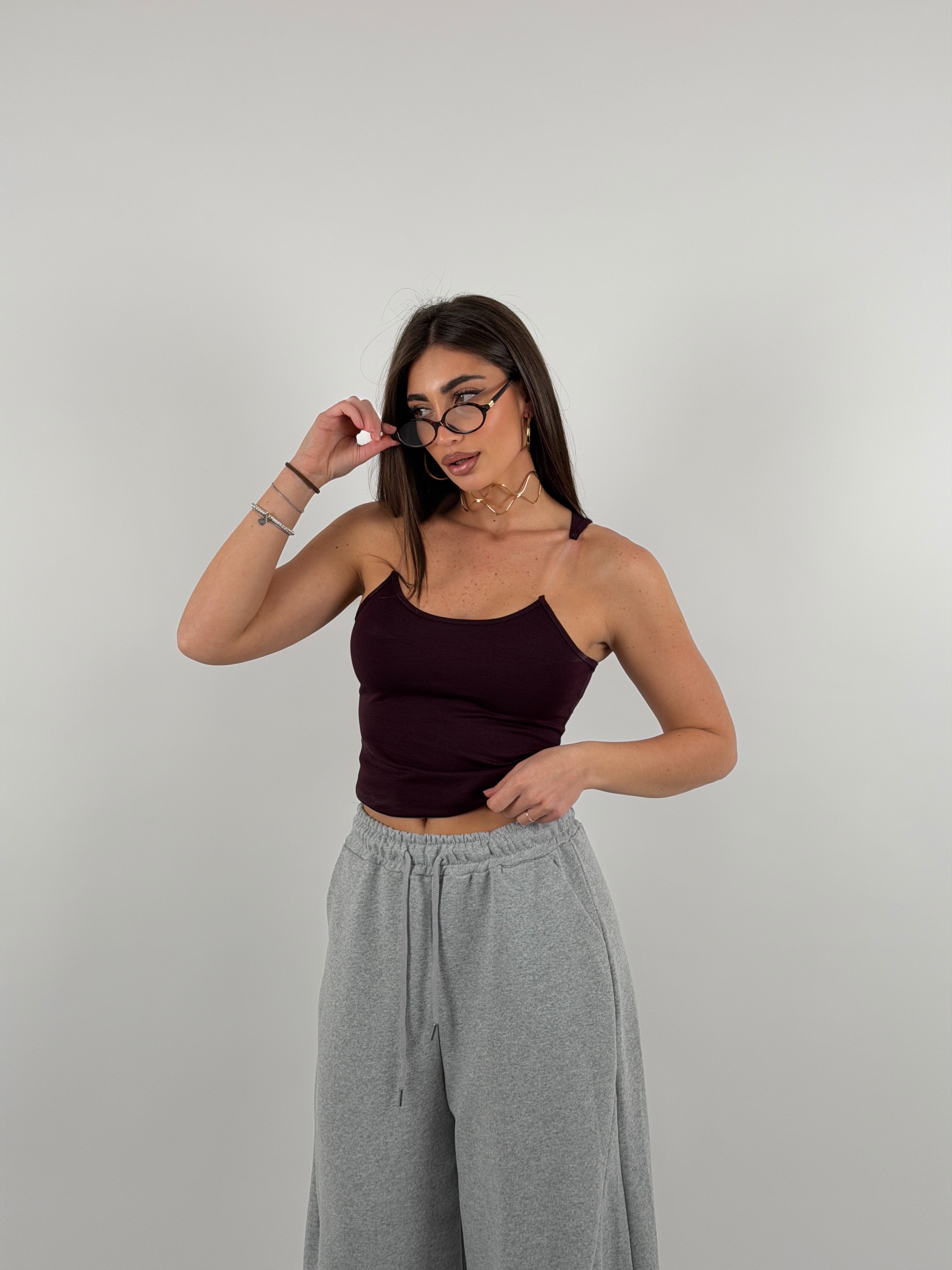 Top con bretelline in silicone trasparente, tessuto a costine strette