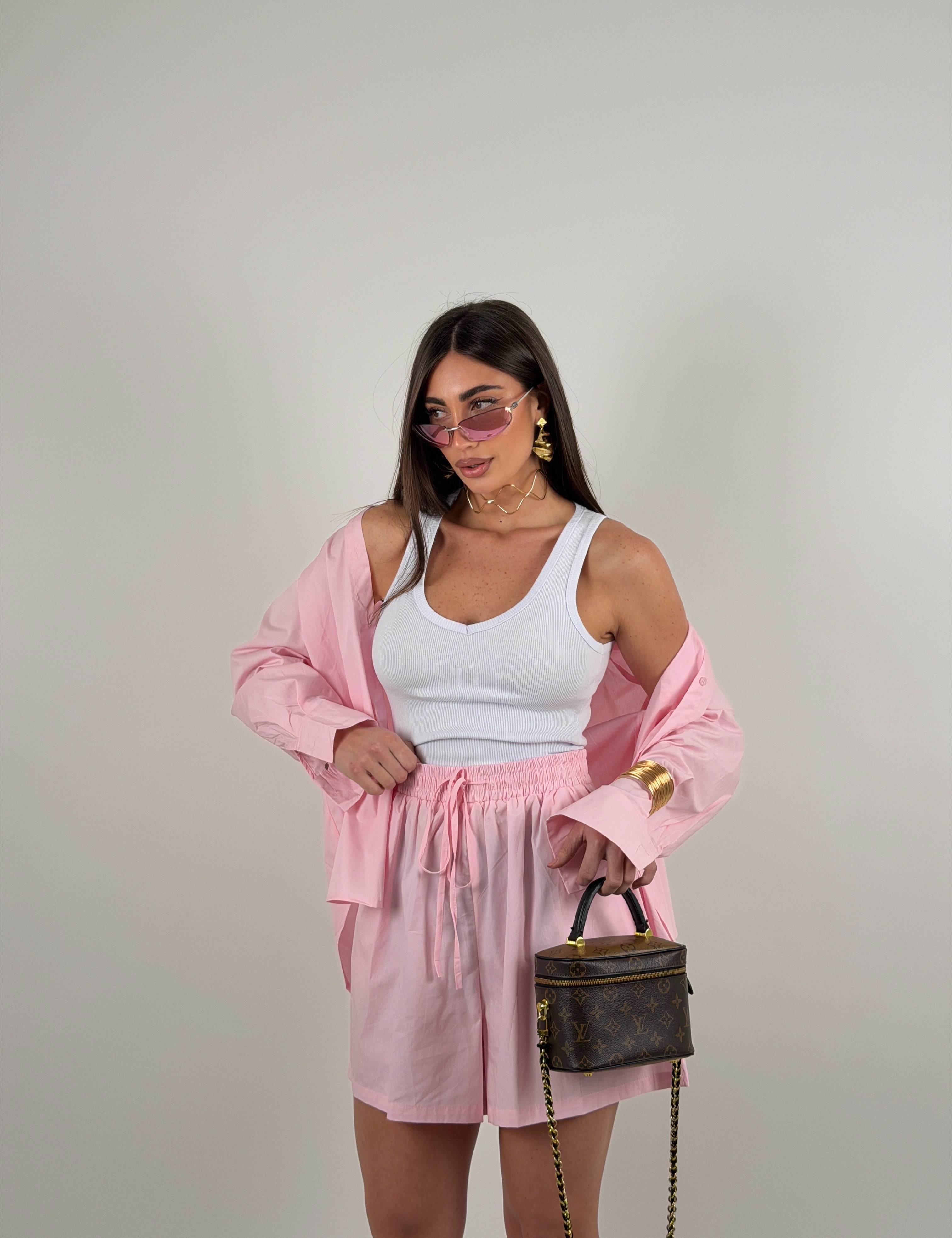 Maglia giromanica a costine con scollo a punta