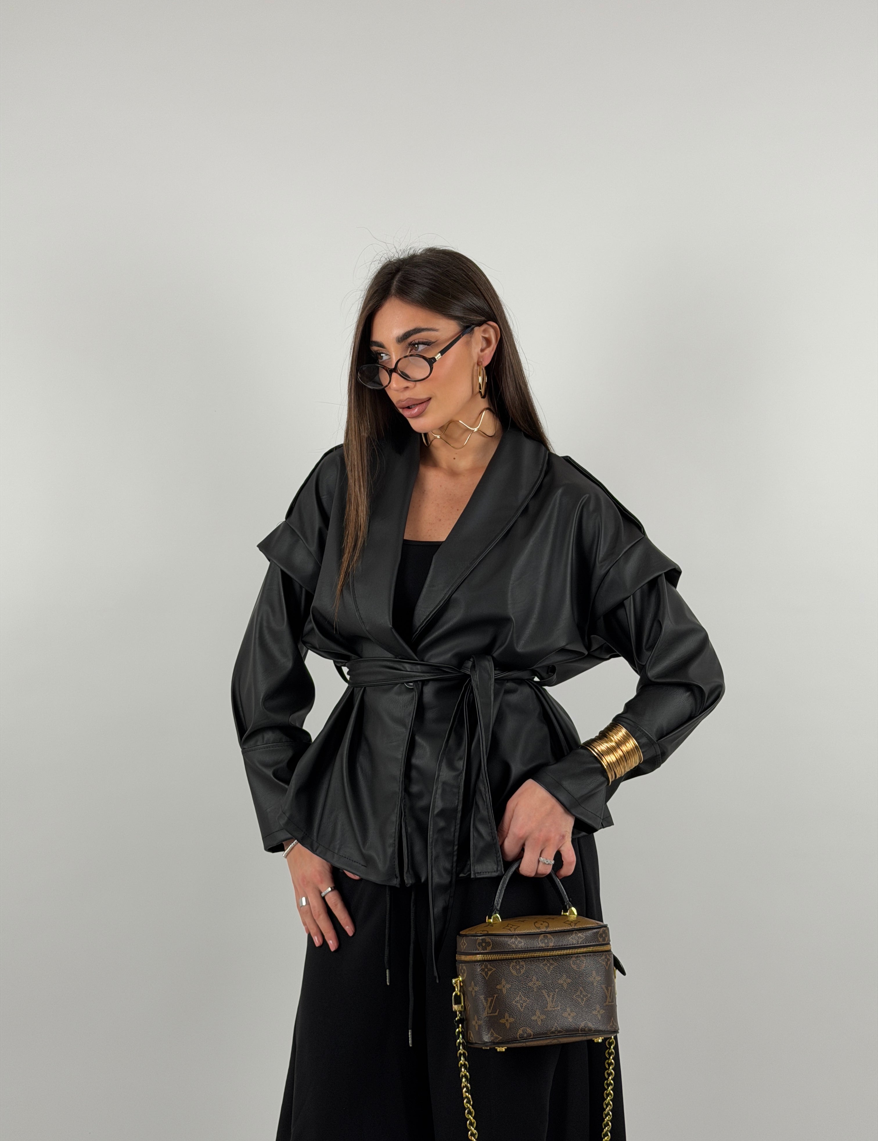 Giacca trench in ecopelle con cintura in vita