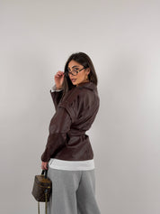 Giacca trench in ecopelle con cintura in vita