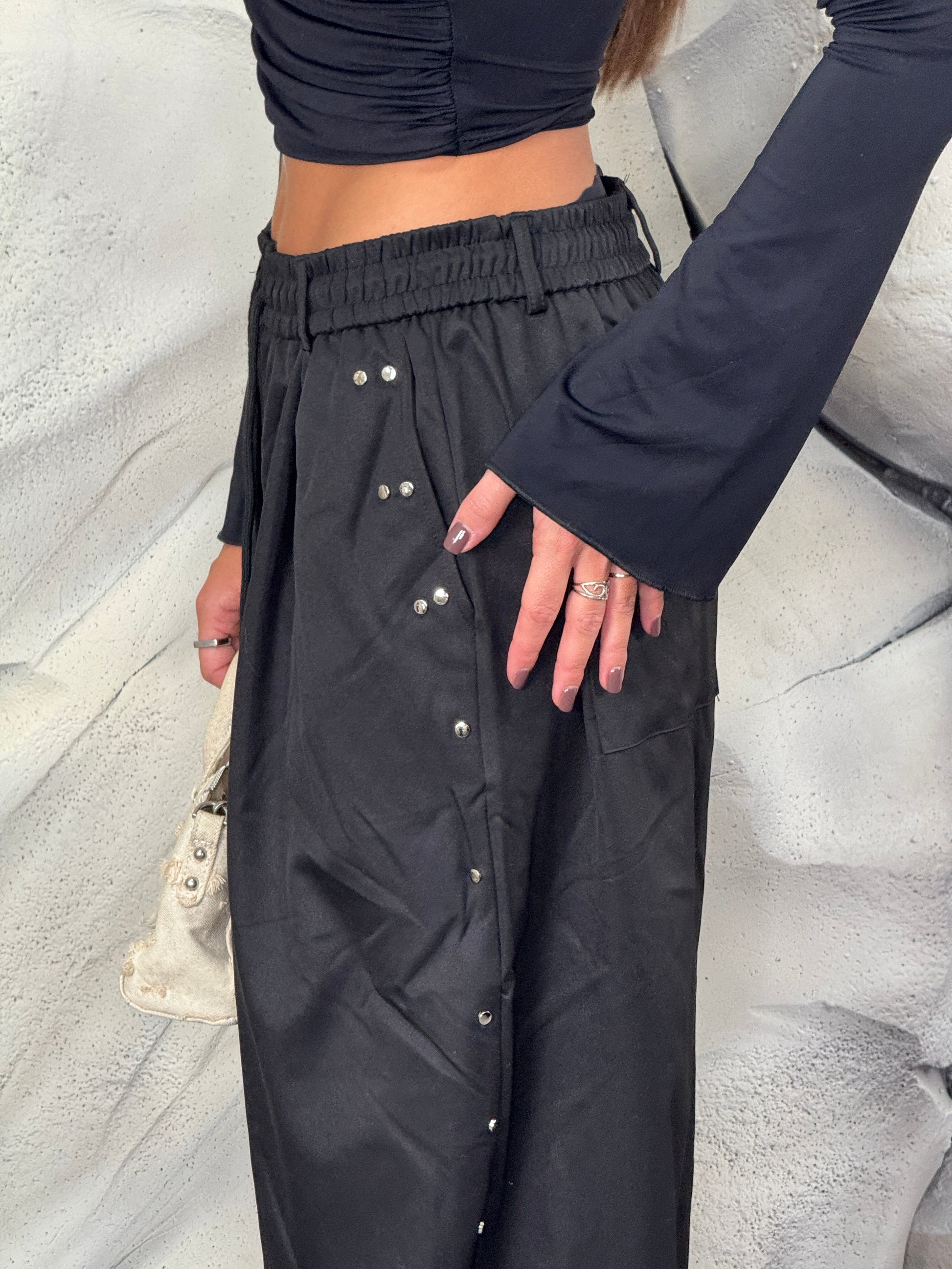 Pantalone borchie