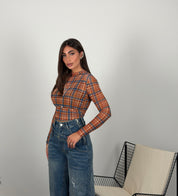 Maglia a quadri semivelata con top