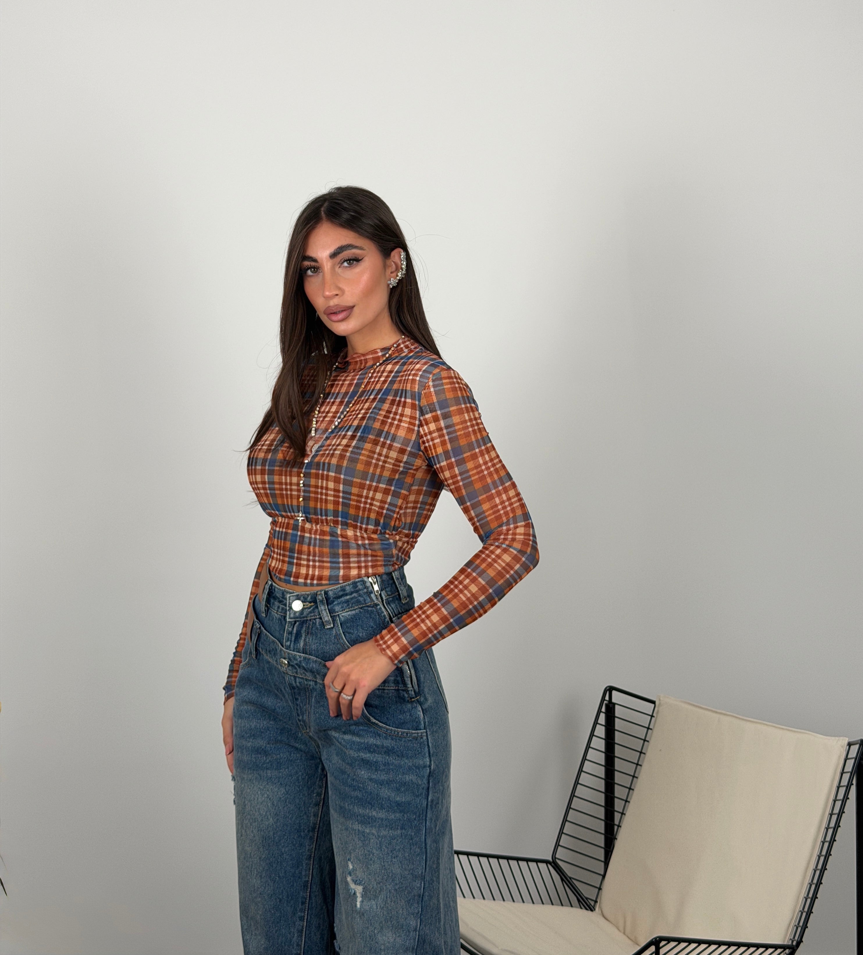 Maglia a quadri semivelata con top