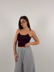 Top con bretelline in silicone trasparente, tessuto a costine strette