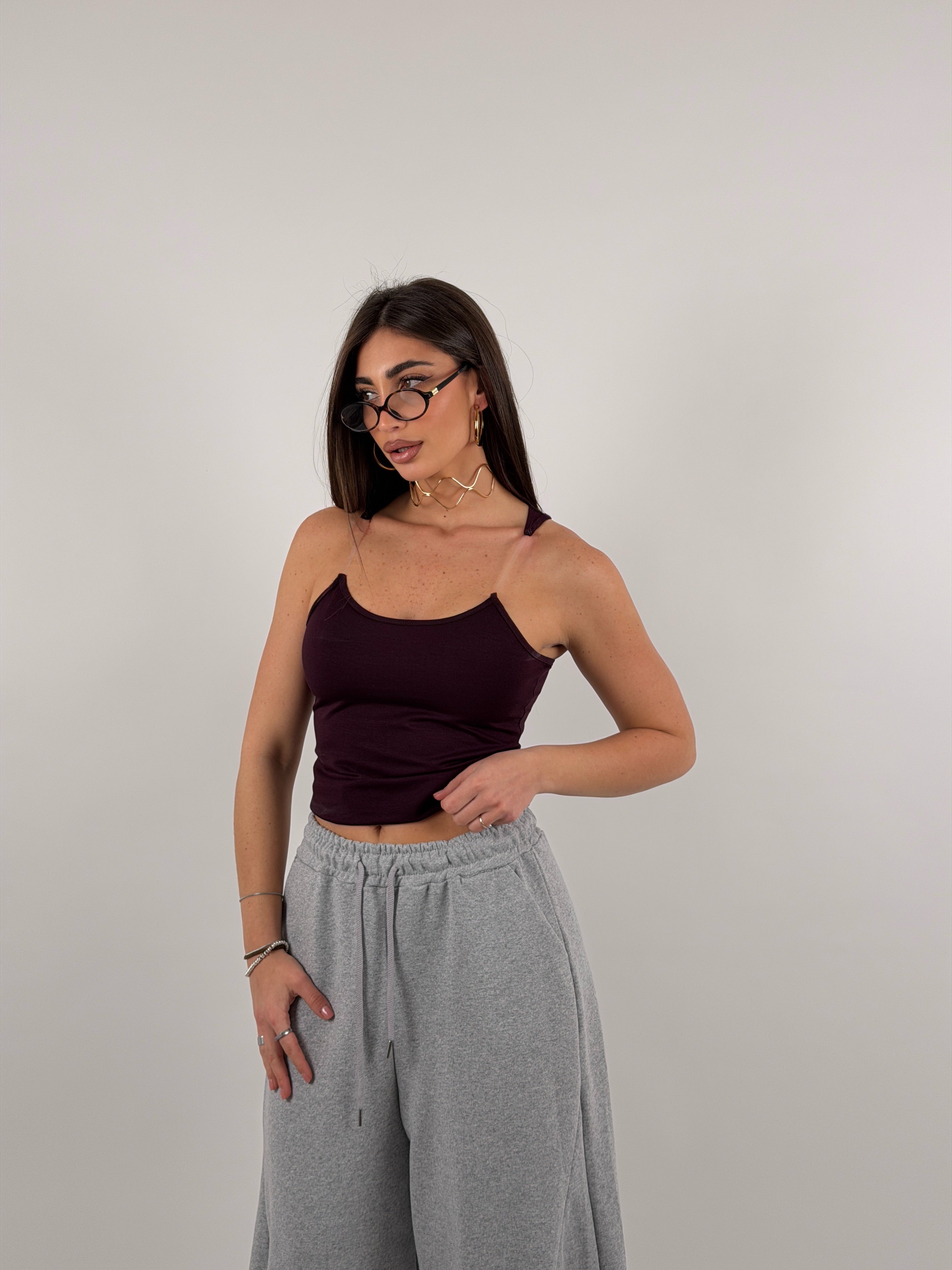 Top con bretelline in silicone trasparente, tessuto a costine strette