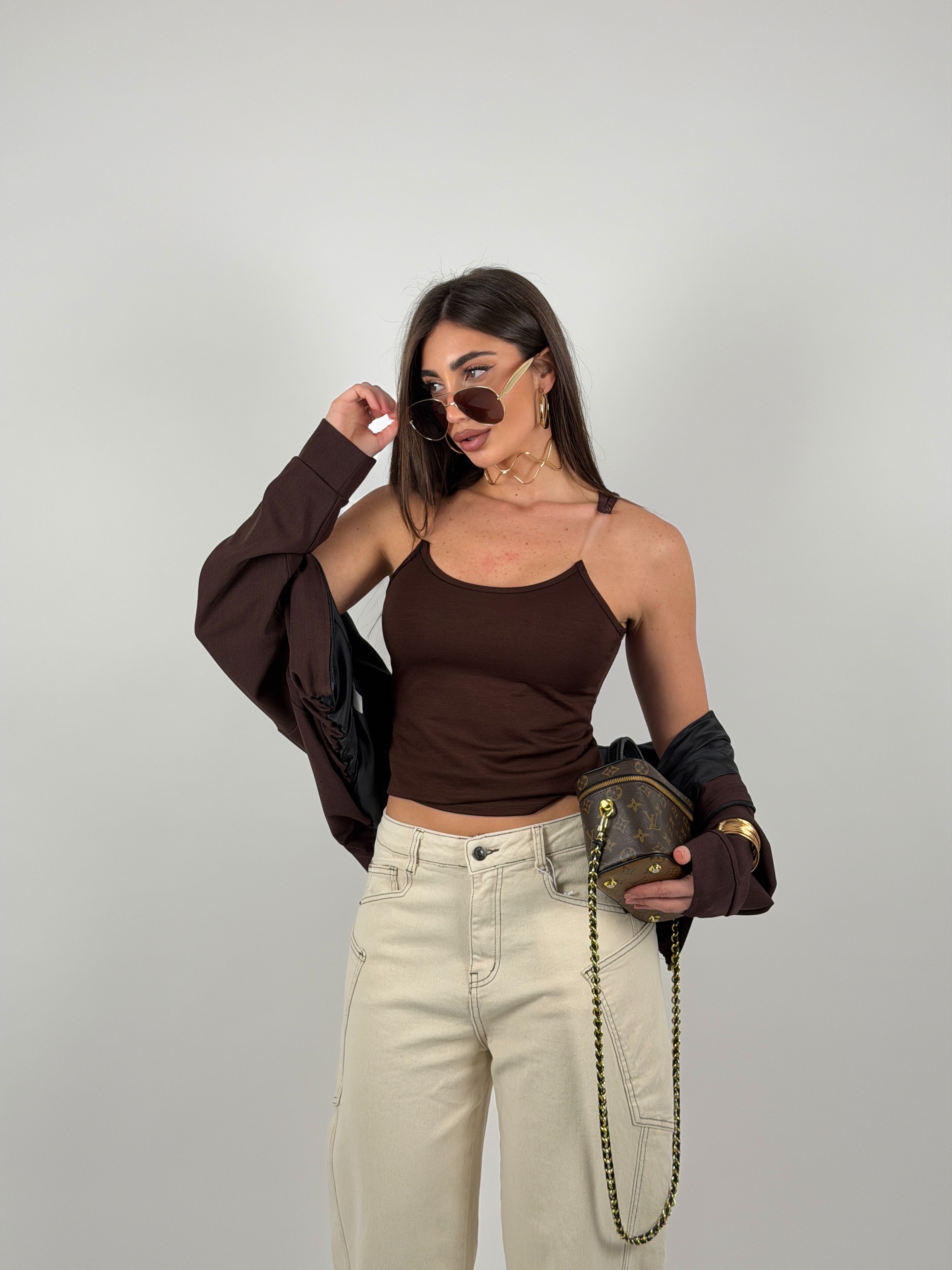 Top con bretelline in silicone trasparente, tessuto a costine strette