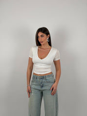 Maglia scollo a V semivelata mezza manica