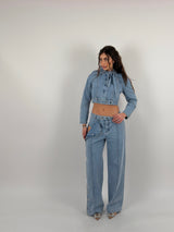 Completo denim chiaro jeans palazzo con bottoni laterali