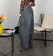 Jeans long fit e risvolto