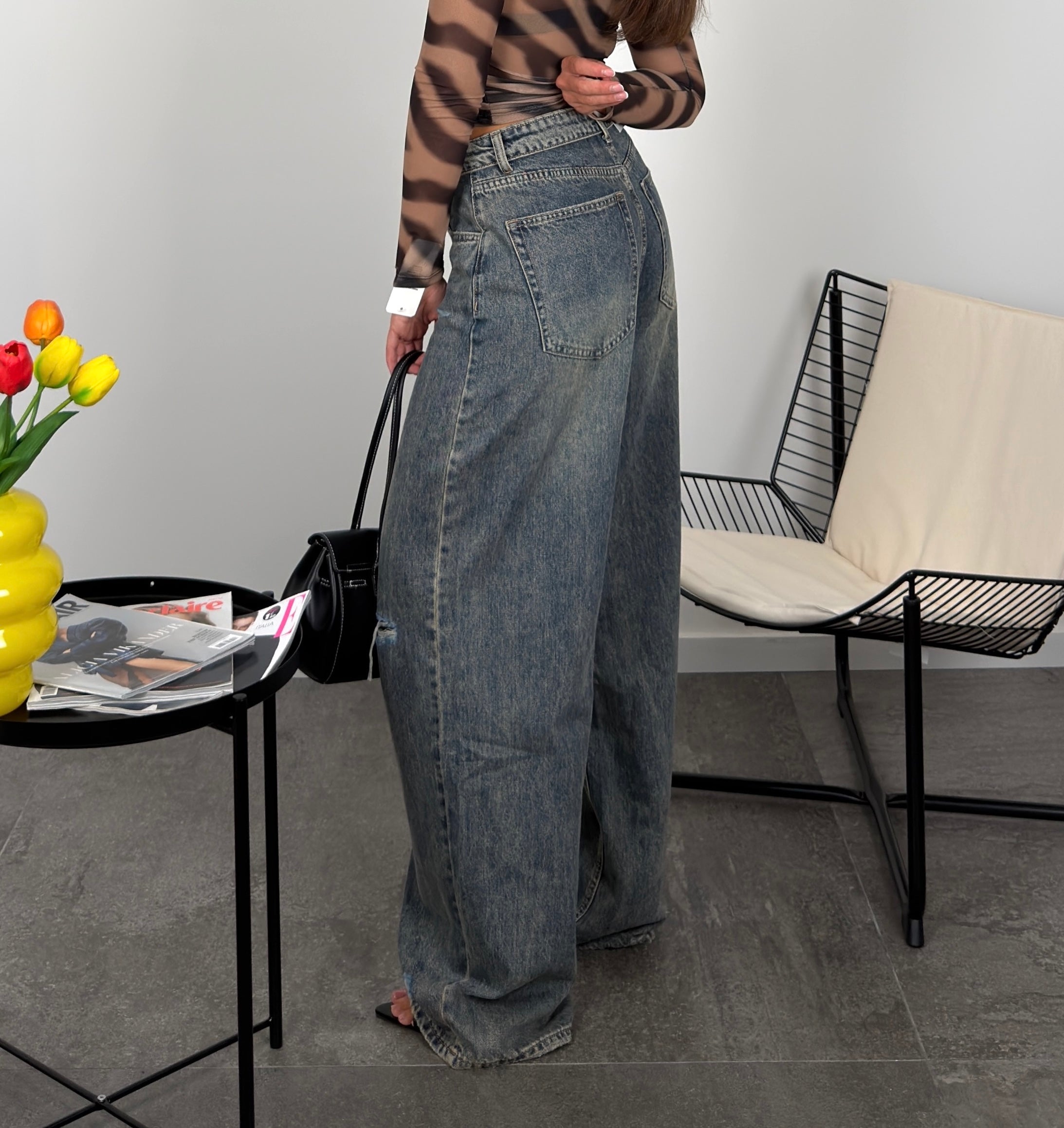 Jeans long fit e risvolto